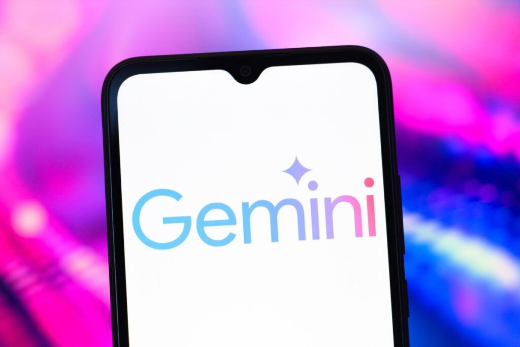 You can now transfer your chats and personal information from other chatbots directly into Gemini The Google Gemini AI logo is seen displayed on a smartphone screen.