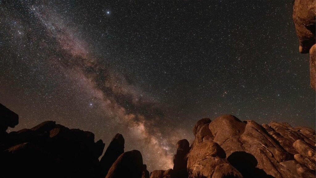 A photograph of various stars in the sky