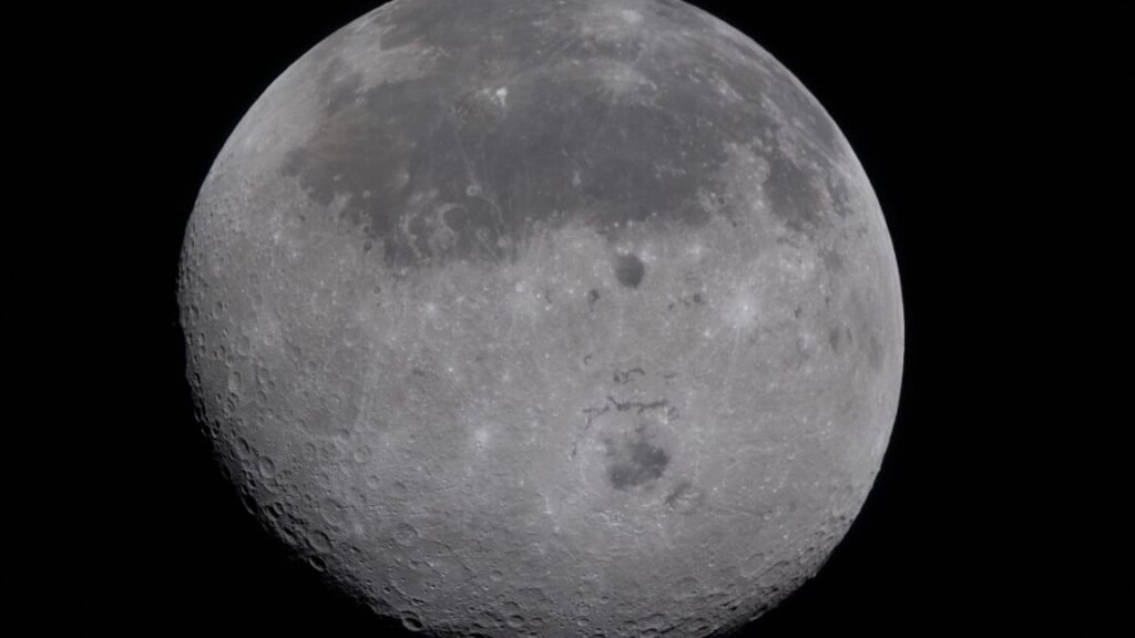 Astronauts set distance record, revealing the Moon as a place to be explored