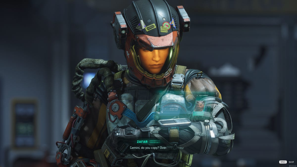 A woman in a space suit answers a call on her wrist-mounted holographic display.