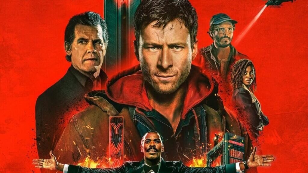 Key art for The Running Man shows Glen Powell and the cast against a bright red backdrop.