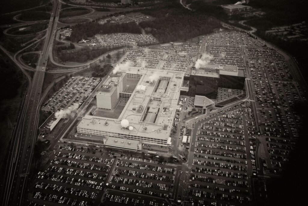 An aerial view of the National Security Agency (NSA) headquarters in Fort Meade, Maryland outside Washington, DC. The NSA is the central producer and manager of signals intelligence for the United States. It operates under the jurisdiction of the Department of Defense and reports to the Director of National Intelligence.