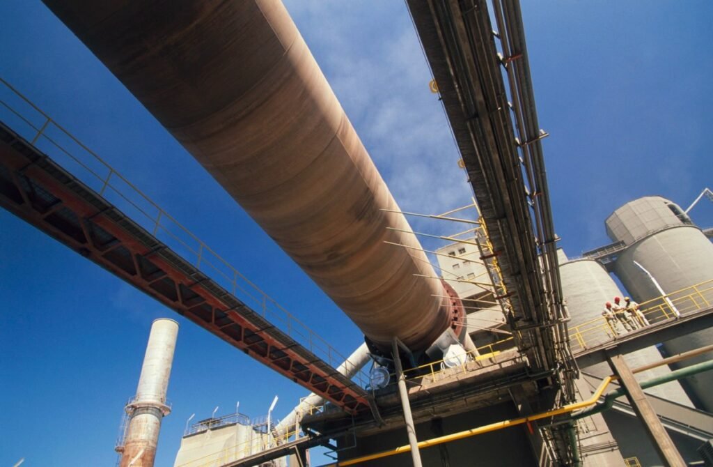 You’ve heard of hybrid cars. Now meet a hybrid cement plant. A rotary kiln at a cement plant viewed from below.