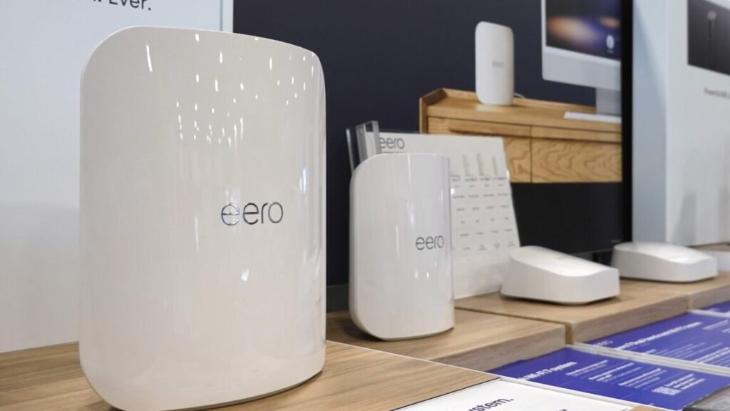Eero Wi-Fi routers on display inside a store in front of an advertisement that says, "Our most advanced Wi-Fi system, ever."