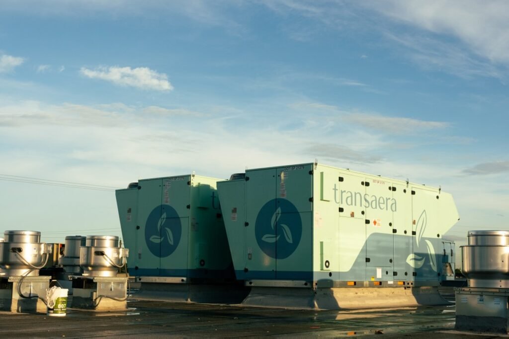 Two DOAS units stand on a rooftop.