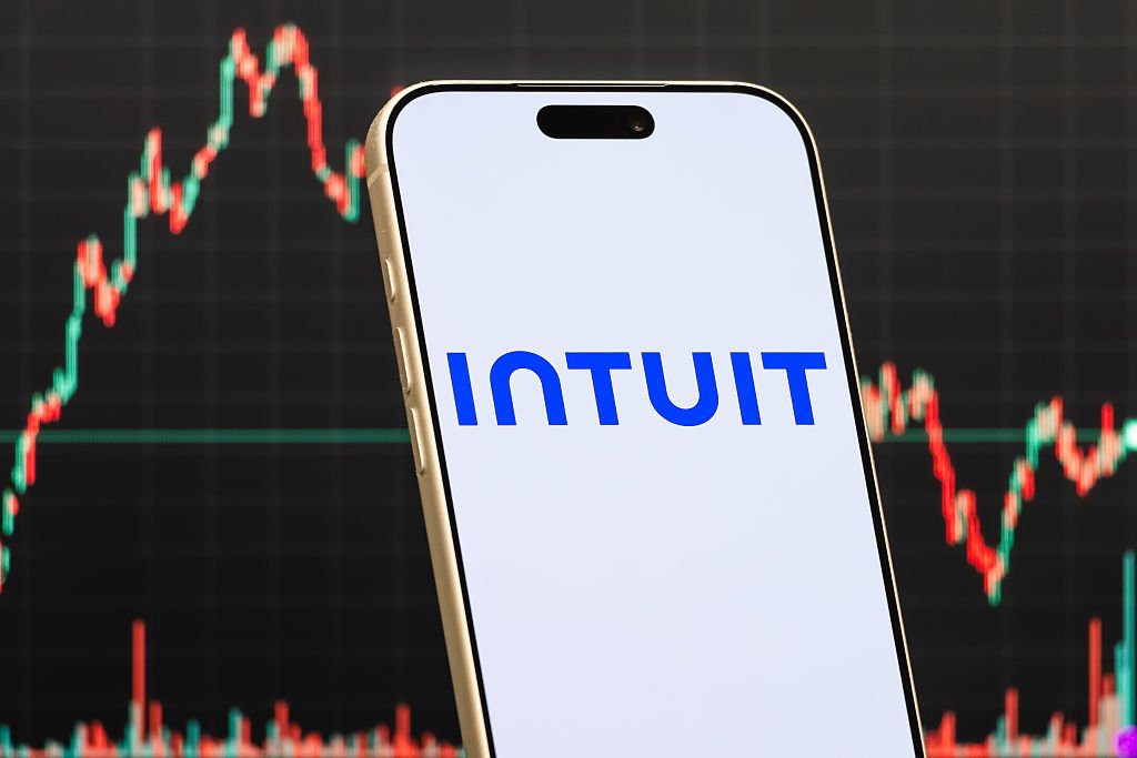 Intuit to lay off over 3,000 employees to refocus on AI a smartphone displays the logo of Intuit Inc