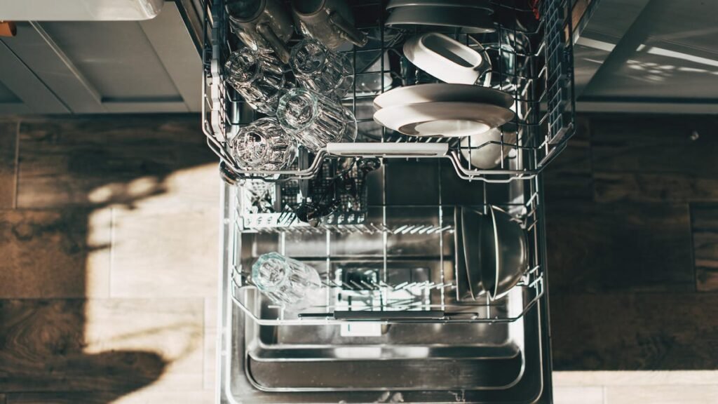 An open dishwasher viewed from above