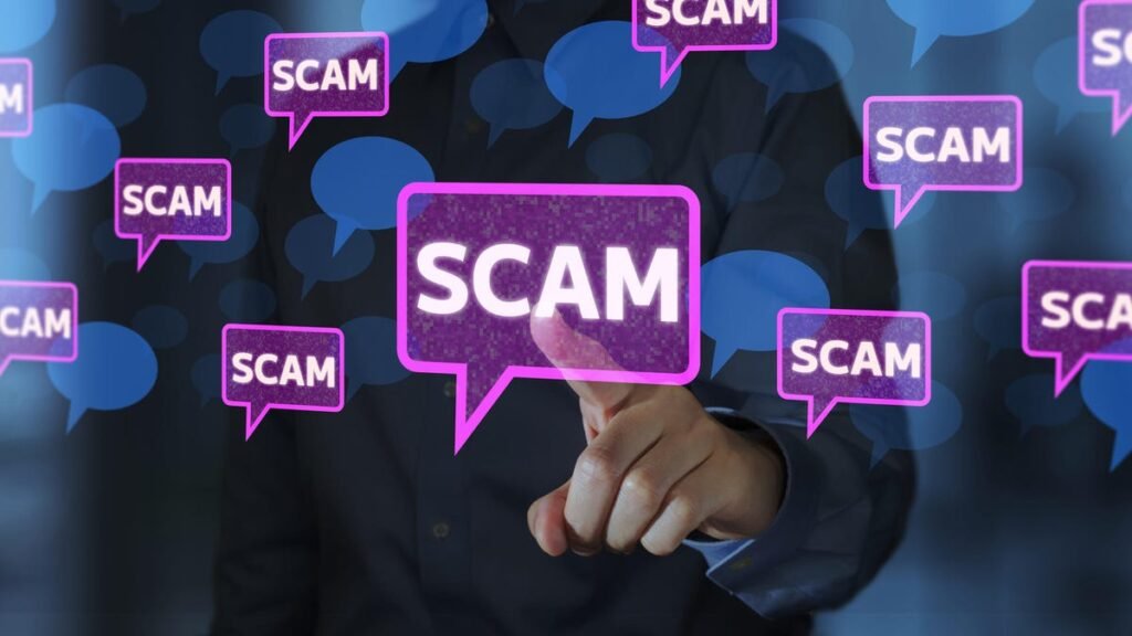 A man tapping on a scam message bubble