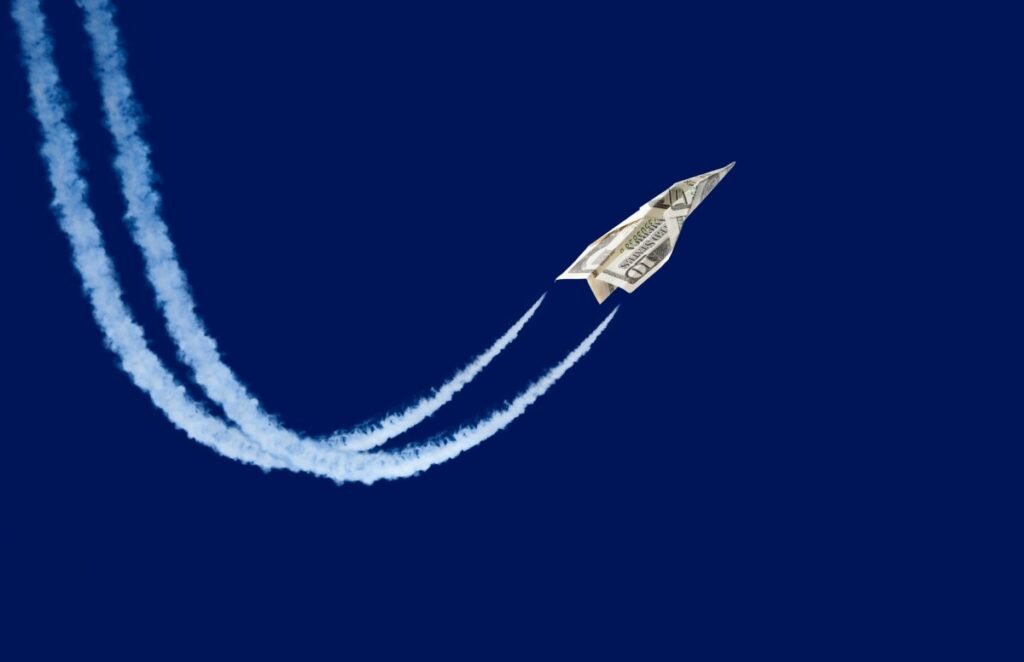 OpenRouter more than doubles valuation to $1.3B in a year paper plane made from a ten-dollar bill 'flying' with contrails