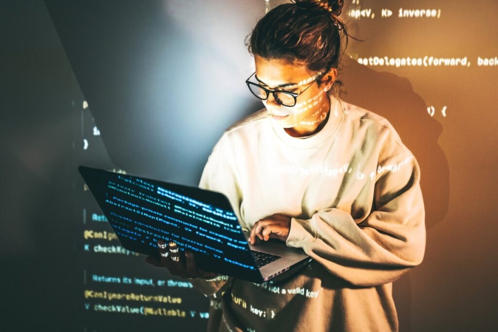South Korea’s LetinAR is building optics behind AI glasses Young woman programming.