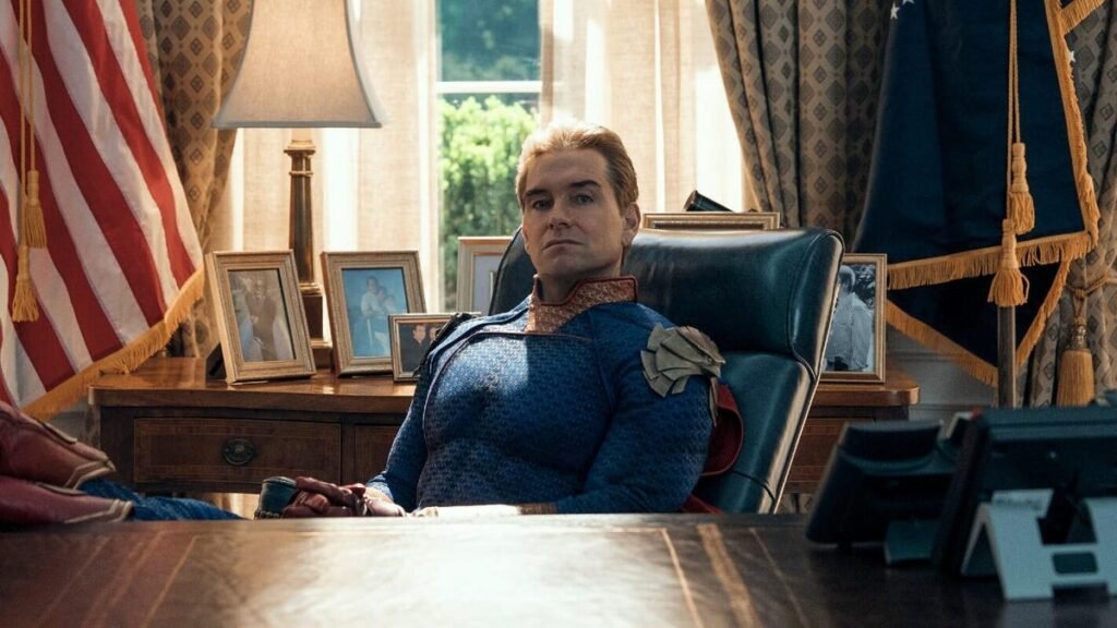 Antony Starr as Homelander sits with his feet up on the desk in the Oval Office.
