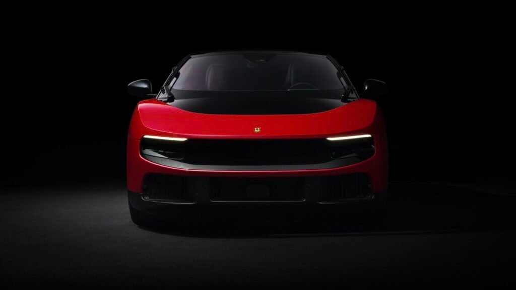 A red Ferrari Luce, head-on