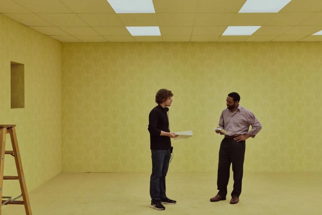 A photo of Kane Parsons and Chiwetel Ejiofor on the set of "Backrooms."