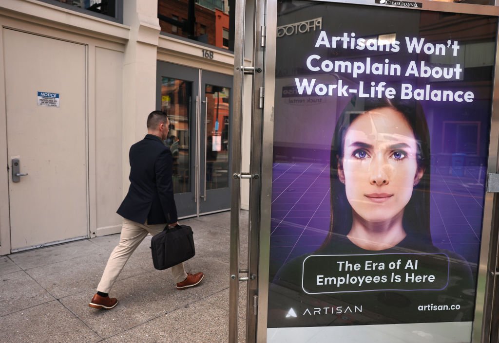 ‘This is fine’ artist KC Green reaches agreement with AI startup Artisan An ad for AI company Artisan is posted on 2nd Street on December 05, 2024 in San Francisco, California.