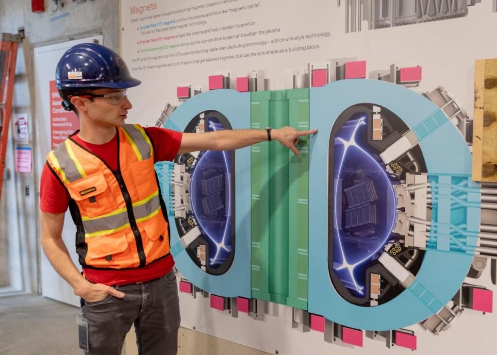 When will fusion power startup Commonwealth Fusion Systems go public? Alex Creely, director of Tokamak operations at Commonwealth Fusion Systems, points to a reactor schematic.
