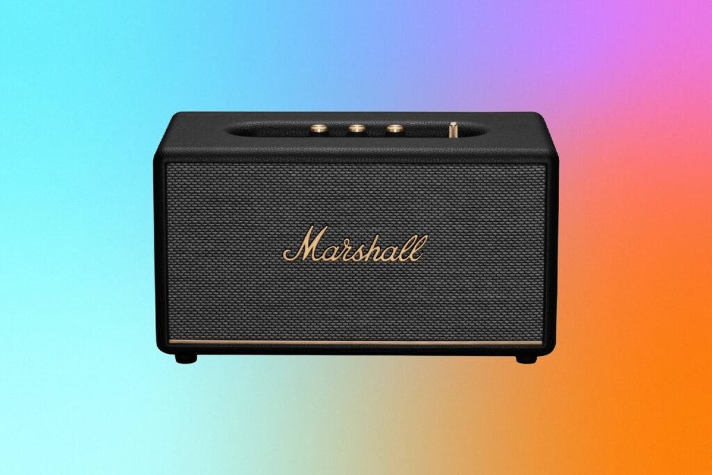 A black speaker against a blue, purple and orange gradient CNET background.