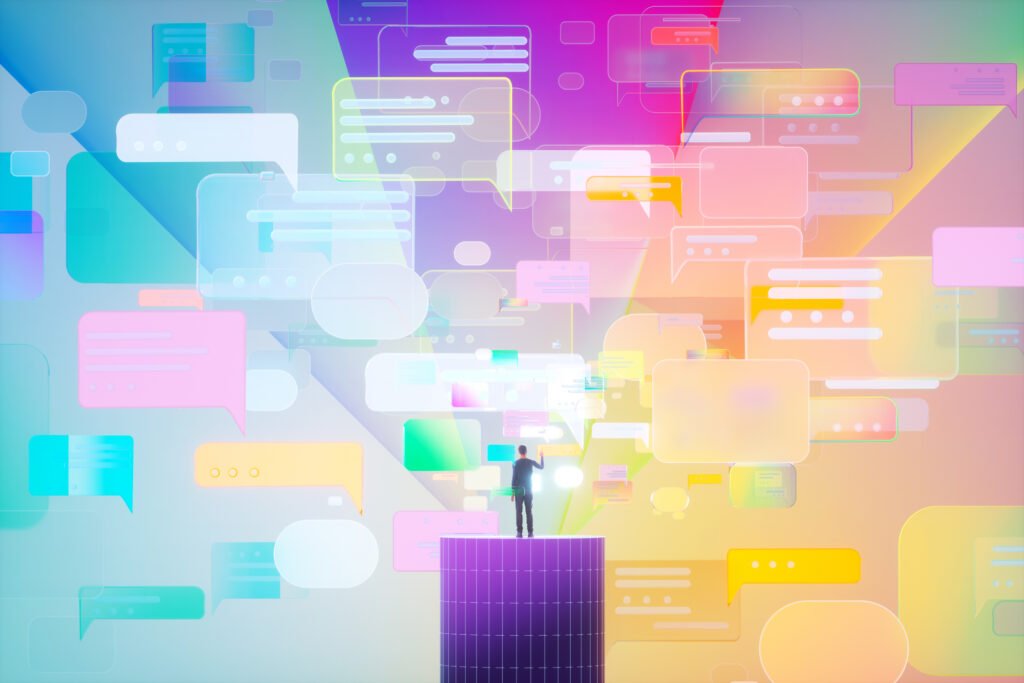 Digital generated image of young man standing on abstract digital cylinder in metaverse world surrounded by multicoloured message chat icons trying to interact with them.