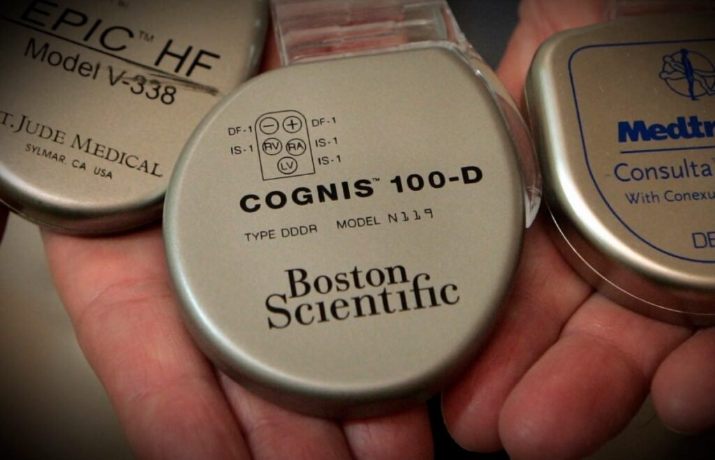 Dr. Leslie Saxon holds implantable cardioverter-defibrillators by three leading manufacturers, St. Jude Medical, left, Boston Scientific and Medtronic, at the Division of Cardiovascular Medicine Keck School of Medicine at University of Southern California in Los Angeles, May 20, 2010. The smart defibrillators monitor and transmit information about heart activity daily to hospital personnel. (Photo by Ann Johansson/Corbis via Getty Images)