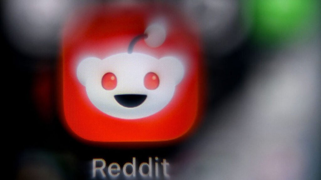 Reddit signals ominous upcoming “changes” for old.reddit.com the logo of Reddit on a smartphone screen