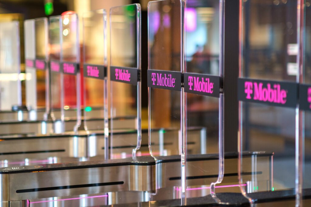 T-Mobile Just Quietly Killed Its Better Value Phone Plan After Less Than a Year T-Mobile-branded clear barrier gates that employees must pass through with a badge.