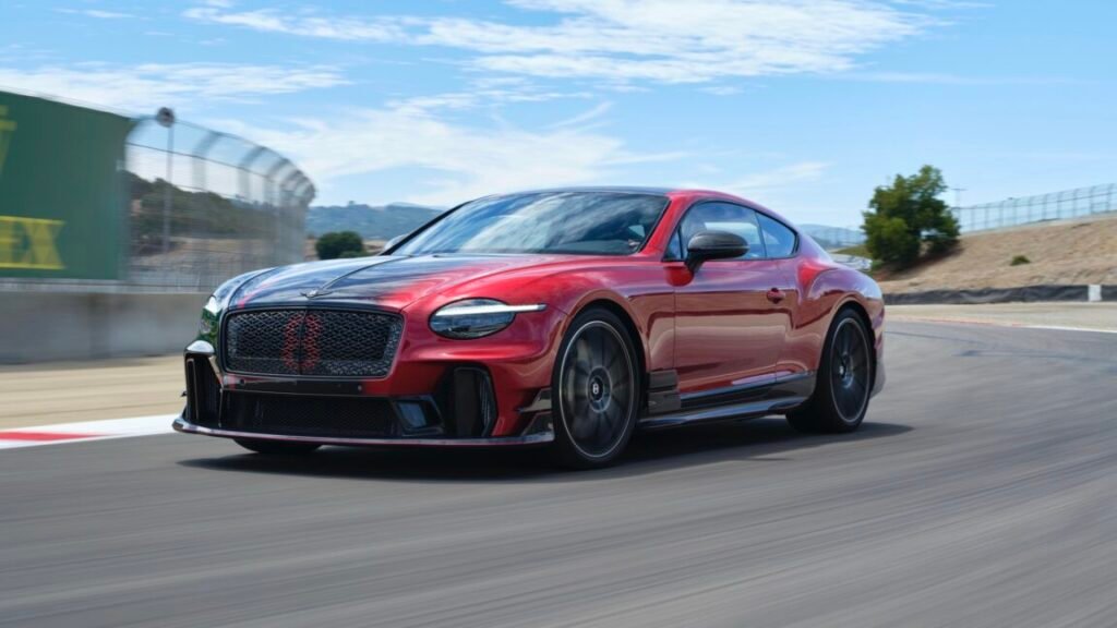 A red and black Bentley on track at Laguna Seca