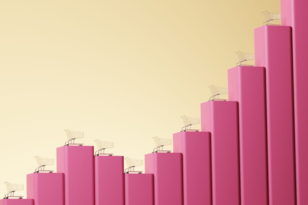 Pink staggered bars with shopping carts on top of each.