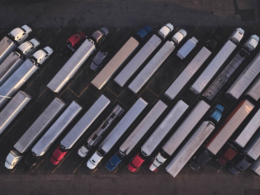overhead shot of parked semi trucks