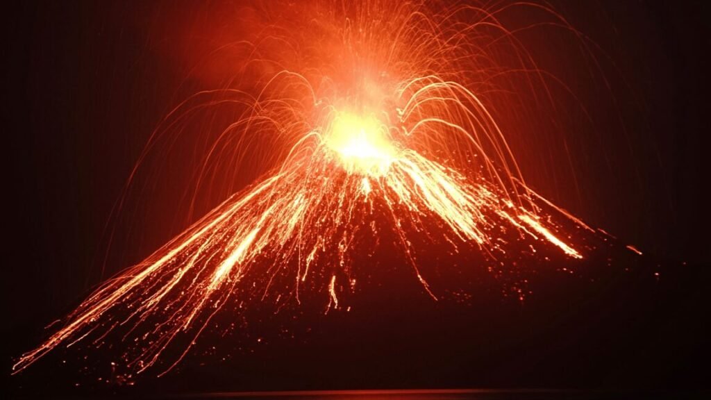 Lava streams down from Anak Krakatau (Child of Krakatoa) volcano during an eruption as seen from Rakata island in South Lampung on July 19, 2018.