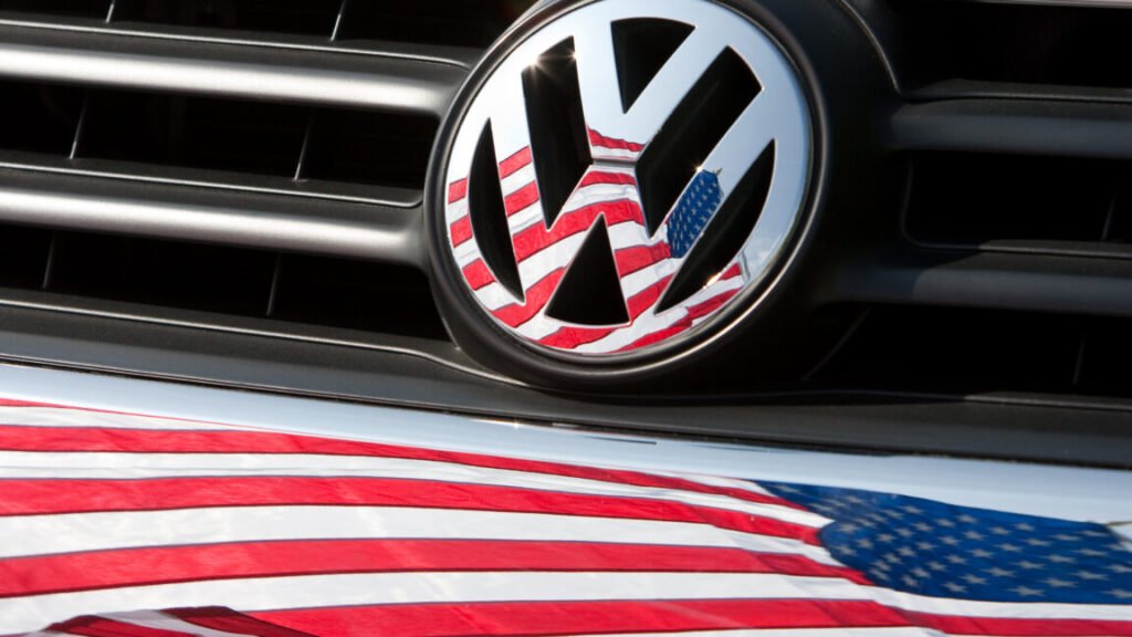FILE - An archive picture of a US-flag that is being reflected in a Volkswagen car front in Chattanooga, US, 15 May 2009. Photo: Friso Gentsch/dpa (Photo by Friso Gentsch/picture alliance via Getty Images)
