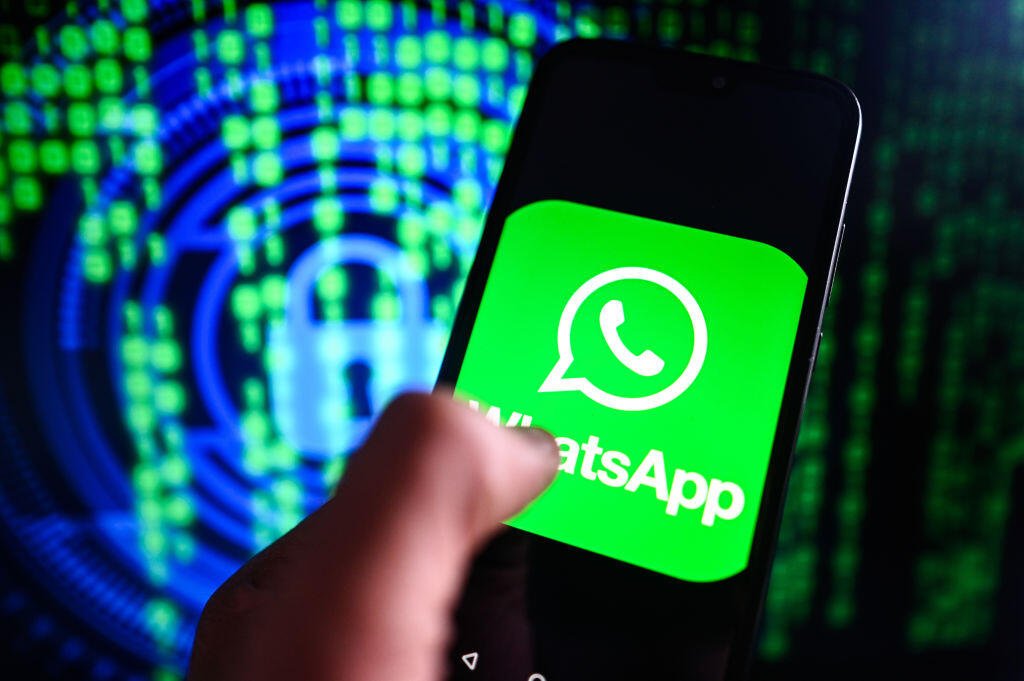 WhatsApp Adds Security Measures to Help Prevent Accounts From Being Hacked What's App logo on a smart phone