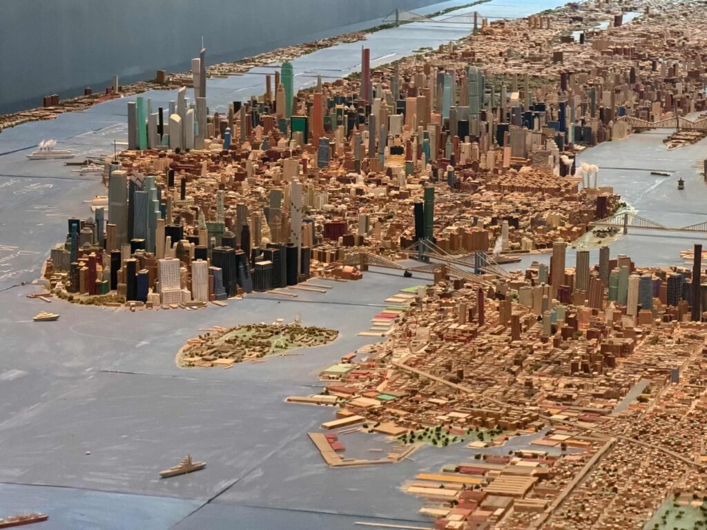 A wide shot of the model of the island of Manhattan, plus the edge of Brooklyn. It looks so great!
