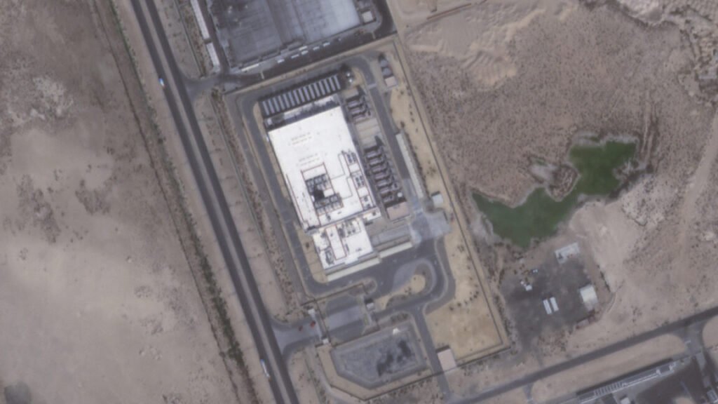 A Planet Labs satellite image shows a top-down view of an Amazon data center in Abu Dhabi, UAE, on March 2, 2026. This data center was damaged by an Iranian drone strike.