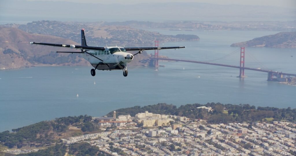 Joby Aviation plane flying over San Francisco wit the Golden Gate Bridge in the background