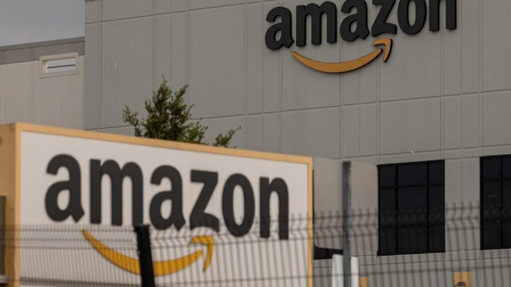 Amazon logos on the outside of one of the company's warehouses.