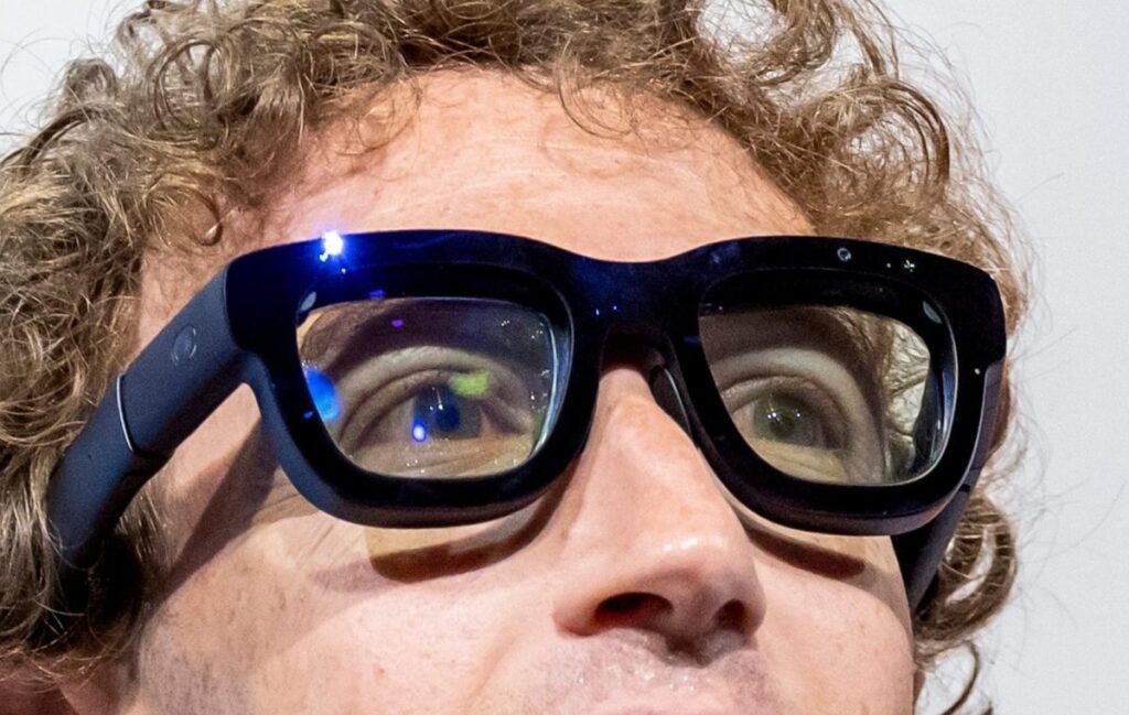 Mark Zuckerberg, chief executive officer of Meta Platforms Inc., wears Orion augmented reality (AR) glasses during the Meta Connect event in Menlo Park, California, US, on Wednesday, Sept. 25, 2024. Meta Platforms Inc. debuted its first pair of augmented reality glasses, devices that show a combined view of the digital and physical worlds, a key step in Chief Executive Officer Mark Zuckerberg's goal of one day offering a hands-free alternative to the smartphone. Photographer: David Paul Morris/Bloomberg via Getty Images