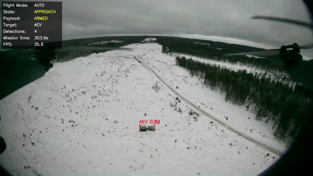 Still image from a video showing the demonstration of Scaleout Systems' AI-enabled target recognition and engagement capability for an autonomous attack drone under the ALMA project led by BAE Systems Bofors. The image shows the quadcopter drone's perspective as it approaches a target identified as an armored engineering vehicle using the words "AEV" with a target identification probability of 89 percent.