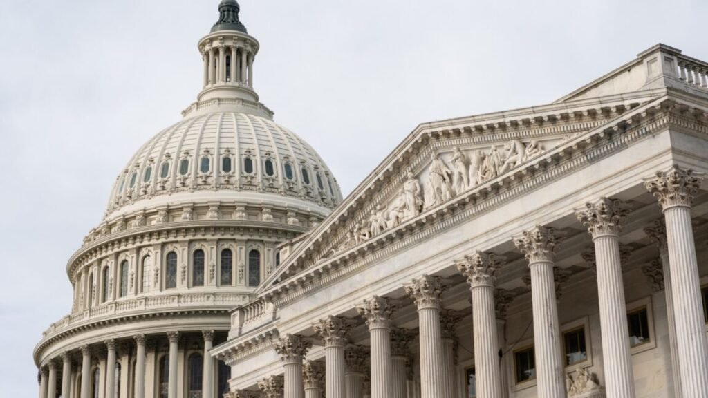 Exterior view of the US Capitol building, including its dome.