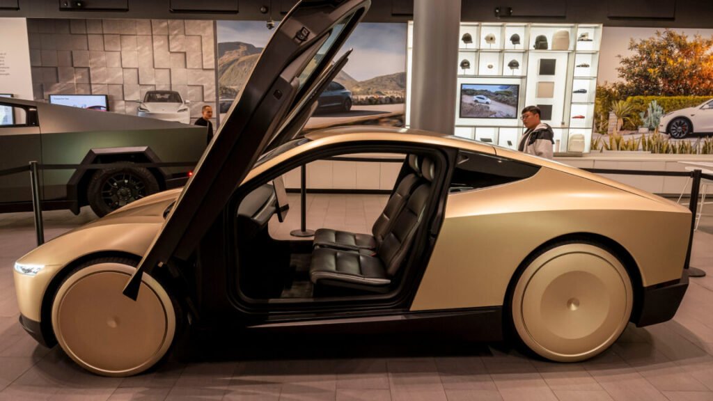 A Tesla Cybercab prototype at a Tesla store in San Jose, California, US, on Tuesday, Nov. 12, 2024. Tesla CEO Elon Musk said the robotaxi, which has no steering wheel or pedals, could cost less than $30,000 and "probably" will go into production in 2026. Photographer: