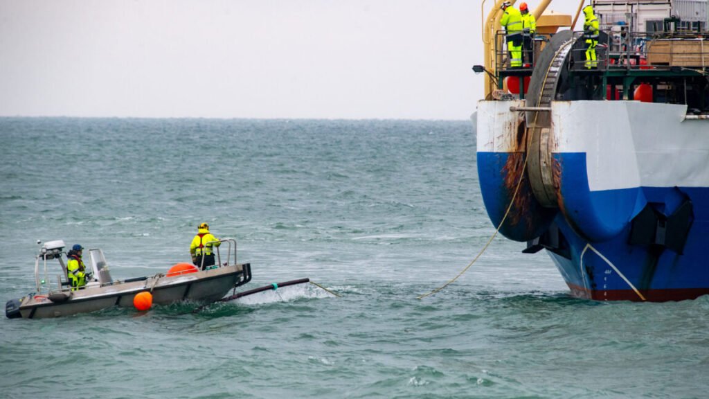 A fiber optic cable is pulled ashore from the cable-laying ship "Pleijel" at the entrance to the port of Sassnitz on the island of Rügen, Germany in November 2023.